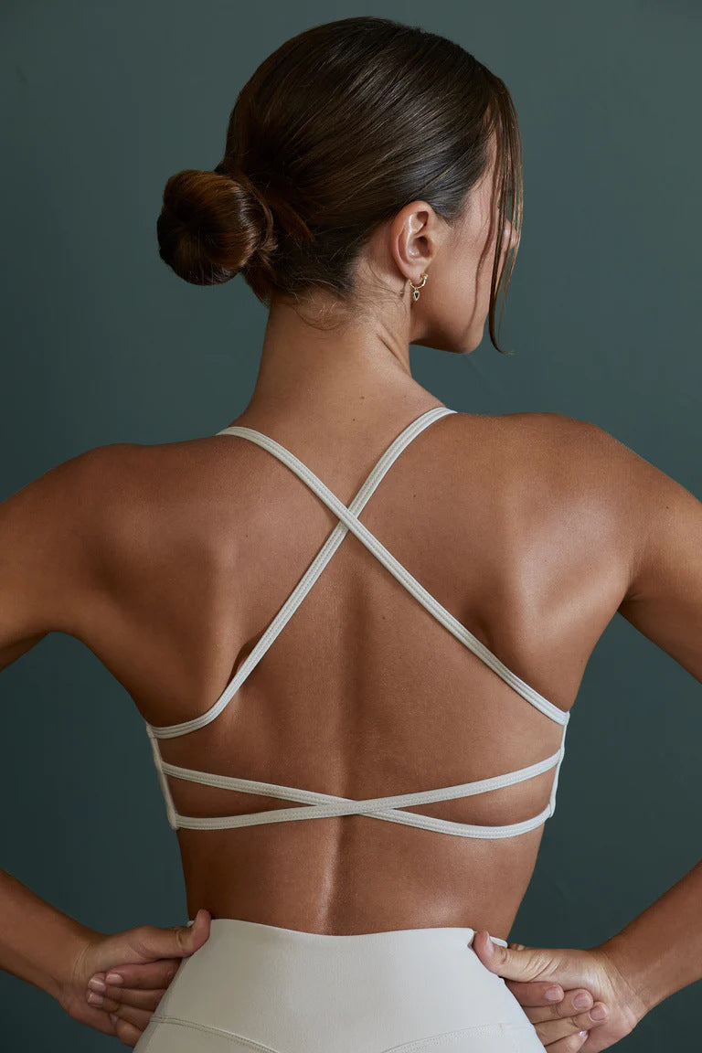 Women cross backless sports bra
